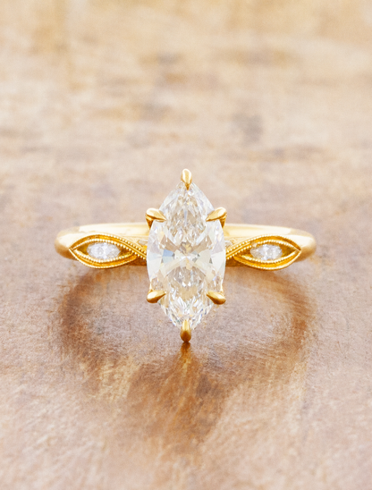 caption:Shown with 1ct marquise in 18k yellow gold 