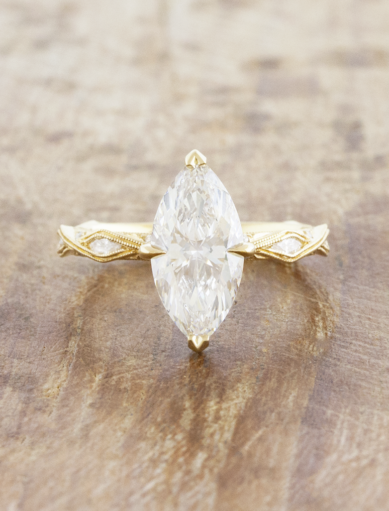 caption:Shown with 2ct marquise diamond in 14k yellow gold 