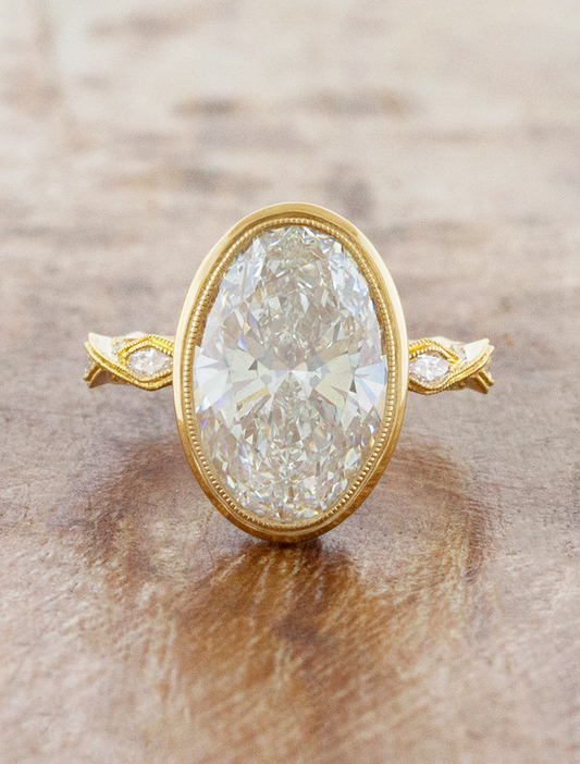 caption:Shown with 4ct oval diamond in 18k yellow gold