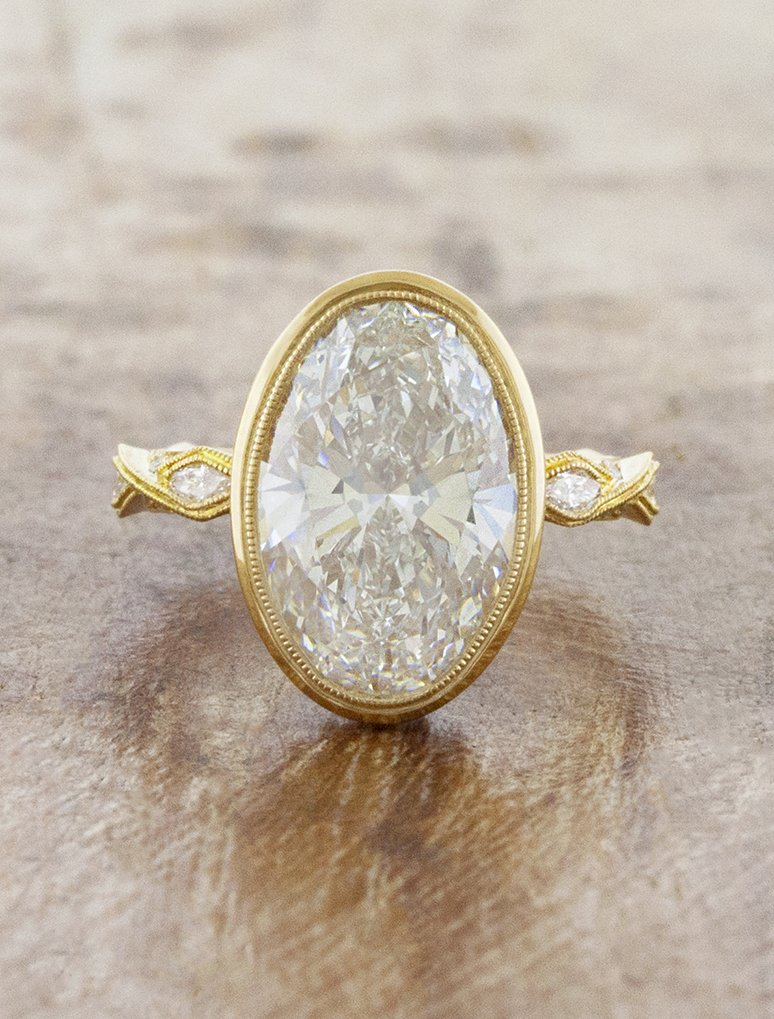 caption:Shown with 4ct oval diamond in 18k yellow gold