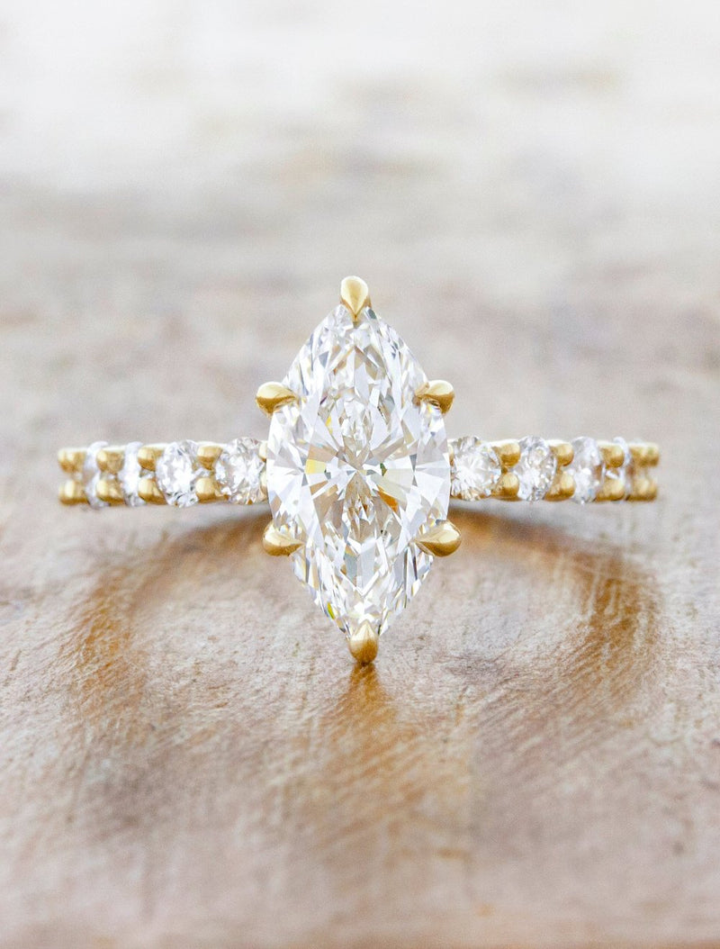 caption:Shown with 1.53ct marquise diamond in 14k yellow gold