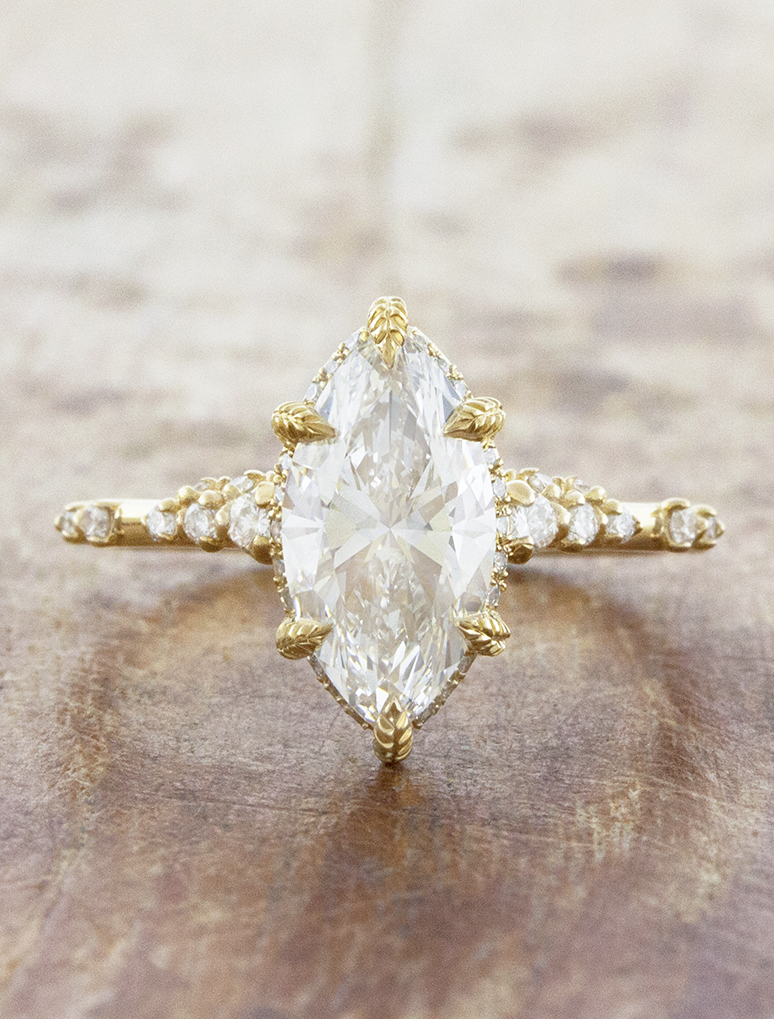 caption:Shown with 1.5ct marquise diamond in 14k yellow gold, customized with leaf prongs