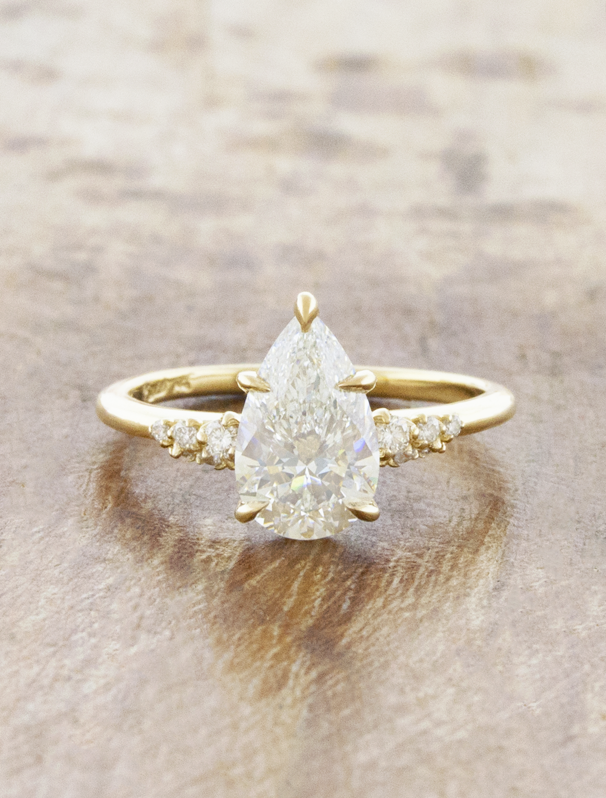 caption:Shown with 1.7ct Pear in 14k yellow gold 