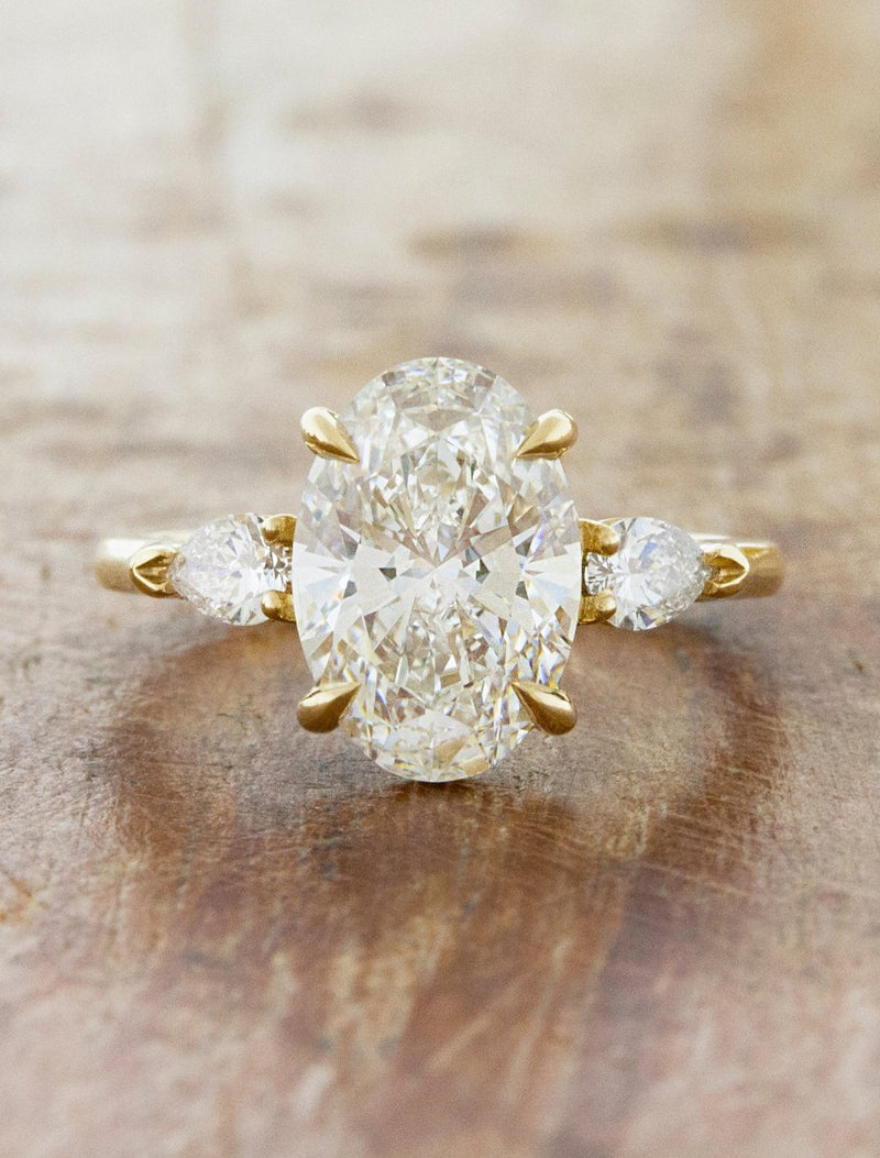 caption:Shown with 2.80ct oval diamond in 14k yellow gold