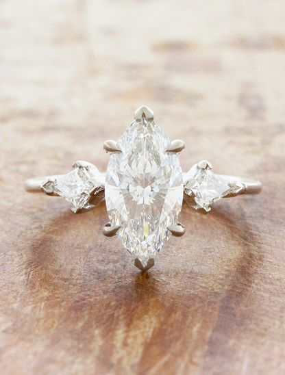 caption:Shown with 1.5ct marquise in platinum
