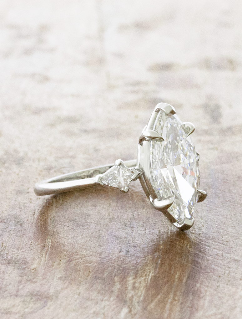 caption:Shown with 3ct marquise in all platinum