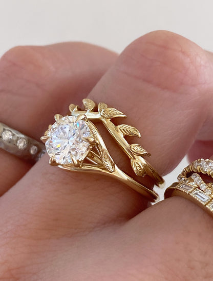 caption:Shown with 1.2ct round in 14k yellow gold, stacked with Addy wedding band