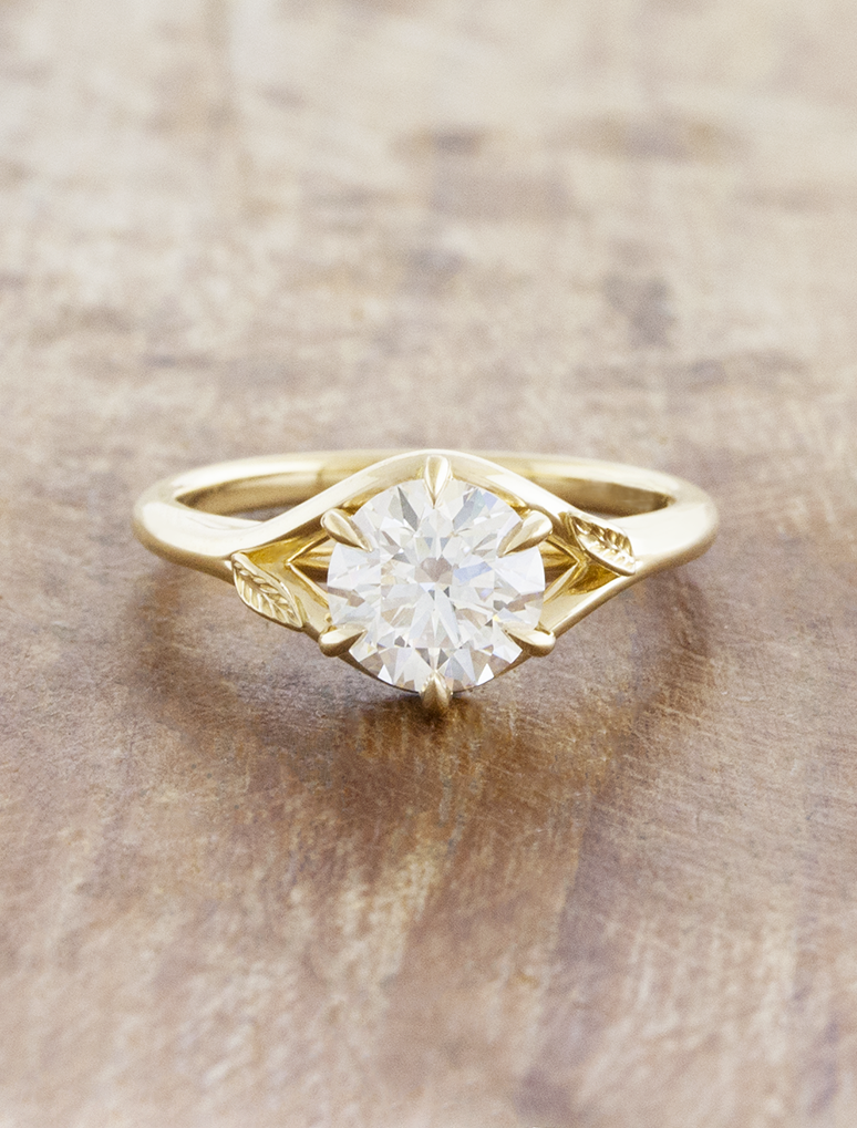 caption:Shown with 1.2ct round in 14k yellow gold
