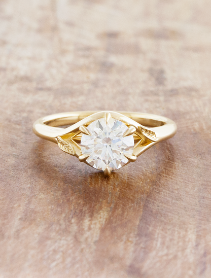 caption:Shown with 1.2ct round in 14k yellow gold