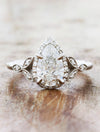 caption:Shown with 1.04ct pear diamond in platinum