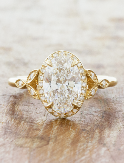 caption:1.70ct oval diamond in 14k yellow gold setting