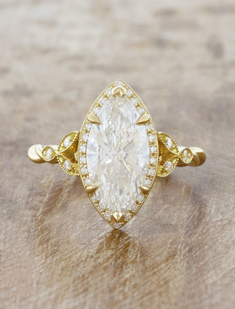 caption:Shown with 2.7ct marquise in 18k yellow gold 