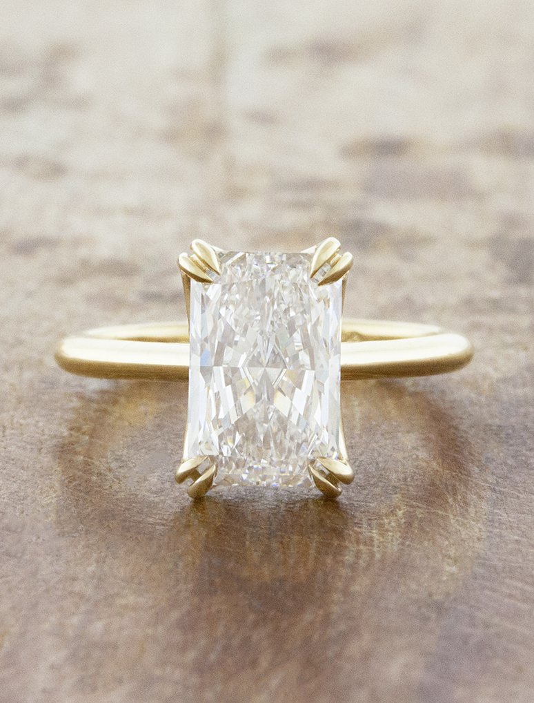 caption:Shown with 2.5ct radiant in 14k yellow gold 