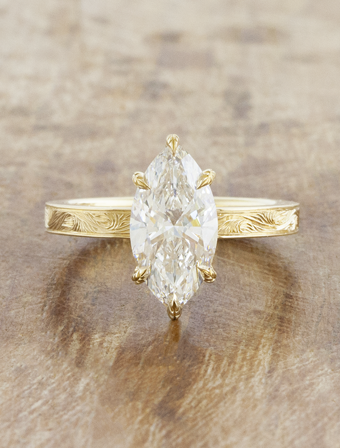 caption:Shown with 2ct marquise in 14k yellow gold 