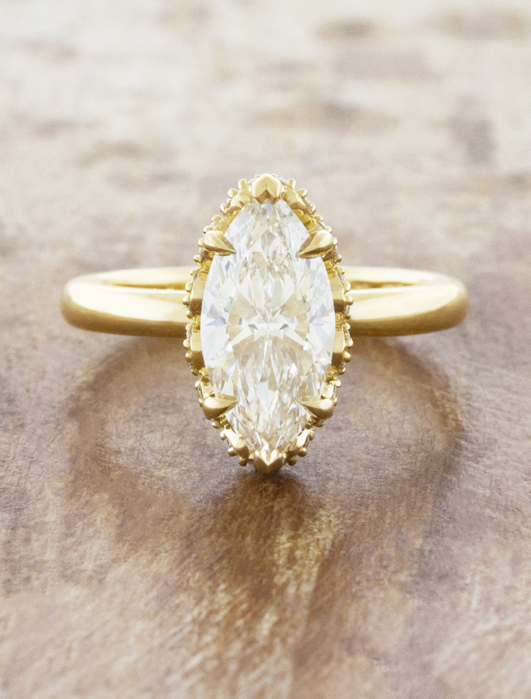 caption:Shown with 2ct marquise in 1k yellow gold