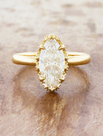 caption:Shown with 2ct marquise in 1k yellow gold