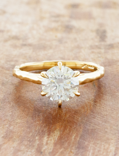 caption: Shown with 1.7ct round in 14k yellow gold