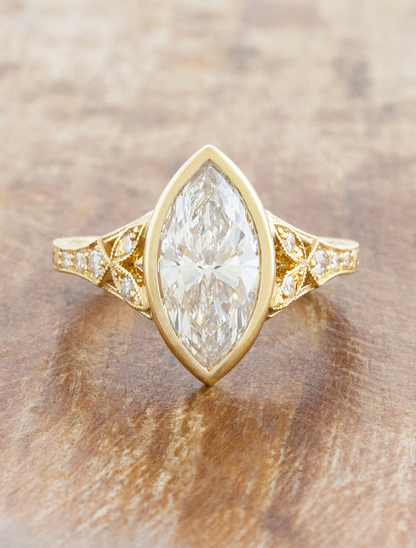 caption:Shown with 1.5ct marquise in 14k yellow gold 