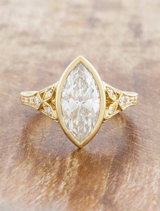 caption:Shown with 1.5ct marquise in 14k yellow gold 