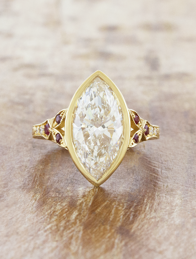 caption:Shown with 2.5ct marquise in 14k yellow gold 