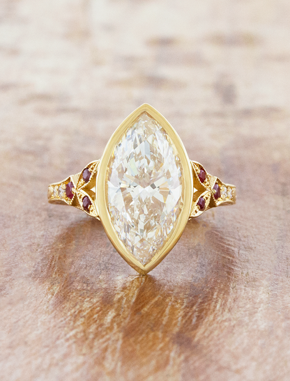 caption:Shown with 2.5ct marquise in 14k yellow gold 