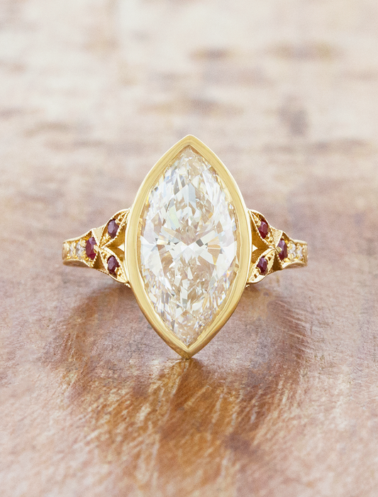 caption:Shown with 2.5ct marquise in 14k yellow gold 