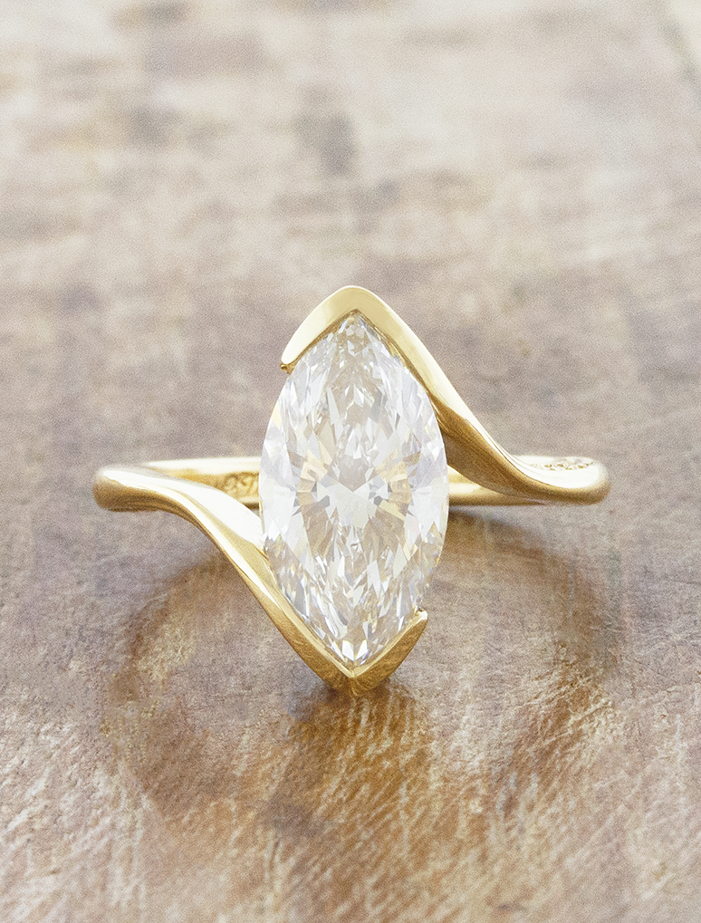 caption:Shown with 2.5ct marquise in 18k yellow gold 