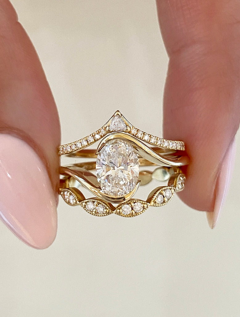 caption:1ct oval diamond in 14k yellow gold