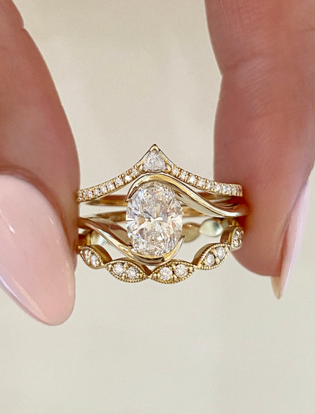 caption:1ct oval diamond in 14k yellow gold