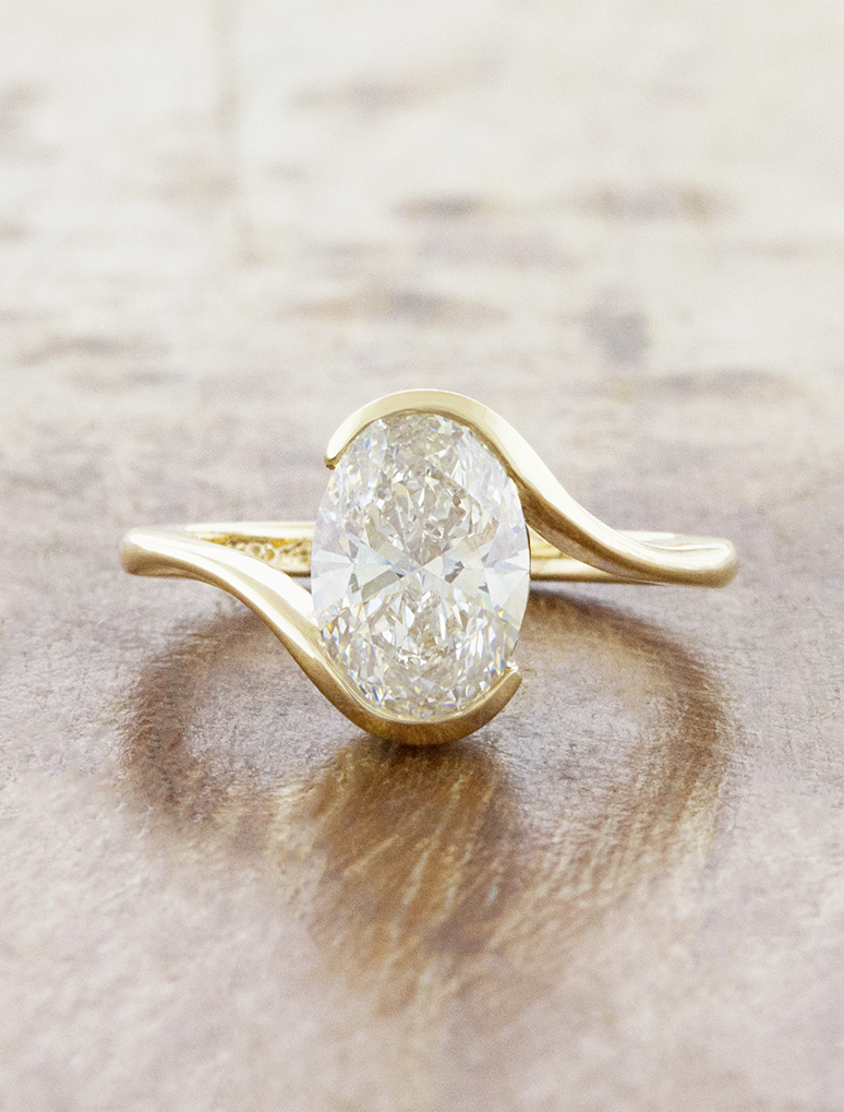 caption:Shown with 2ct oval in 14k yellow gold 