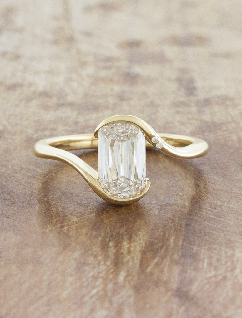 caption:Shown with 2ct crisscut cushion in 14k yellow gold, customized with two accent diamonds