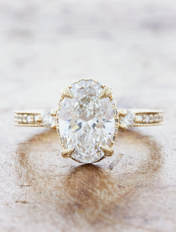 caption:Shown with 1.6ct oval diamond in 14k yellow gold