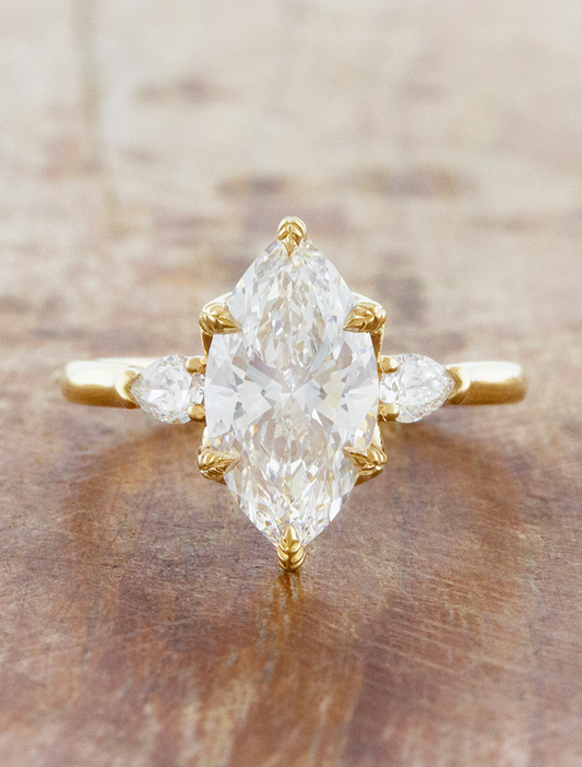 caption:Shown with 3ct marquise diamond in 14k yellow gold