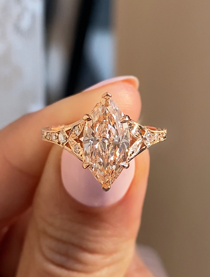 caption:Shown with 2ct fancy pink marquise in 18k rose gold