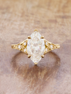 caption:Shown with 2ct marquise in 18k yellow gold