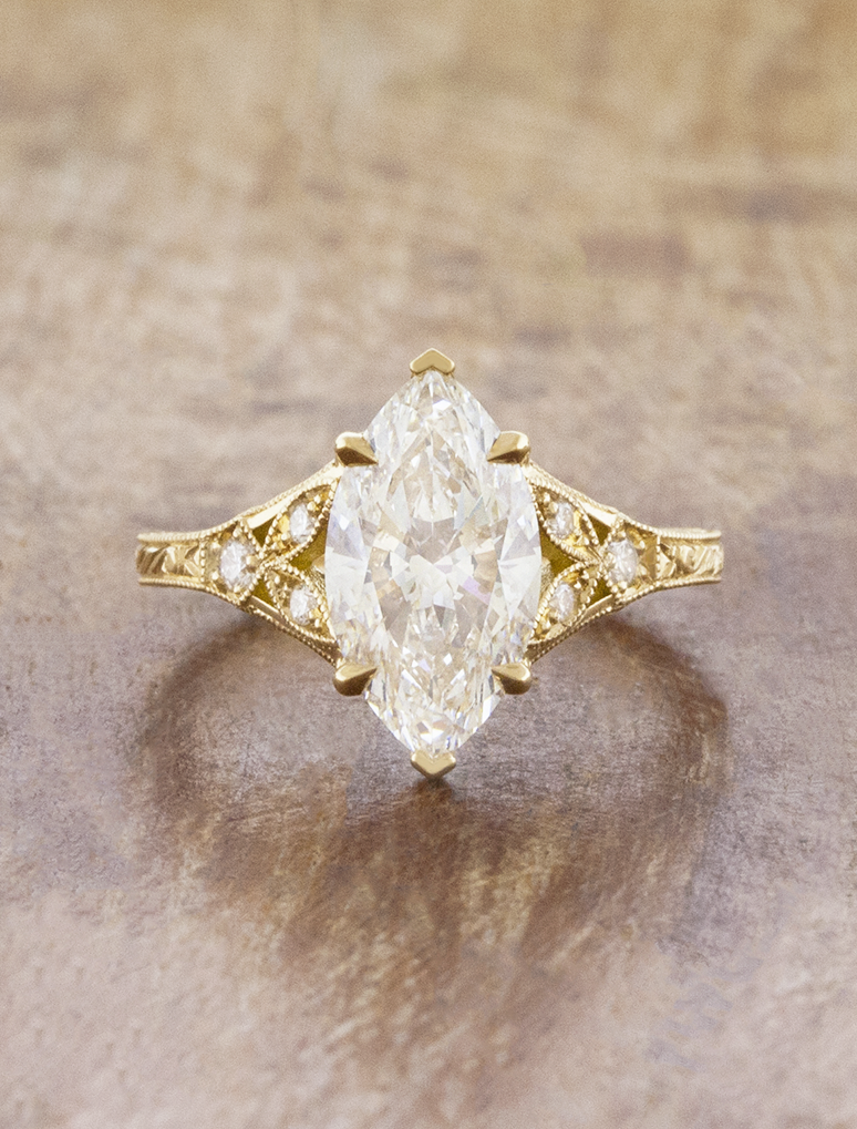 caption:Shown with 2ct marquise in 18k yellow gold
