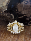 caption:Customized with black diamonds, shown stacked with Tempest and Anu wedding bands