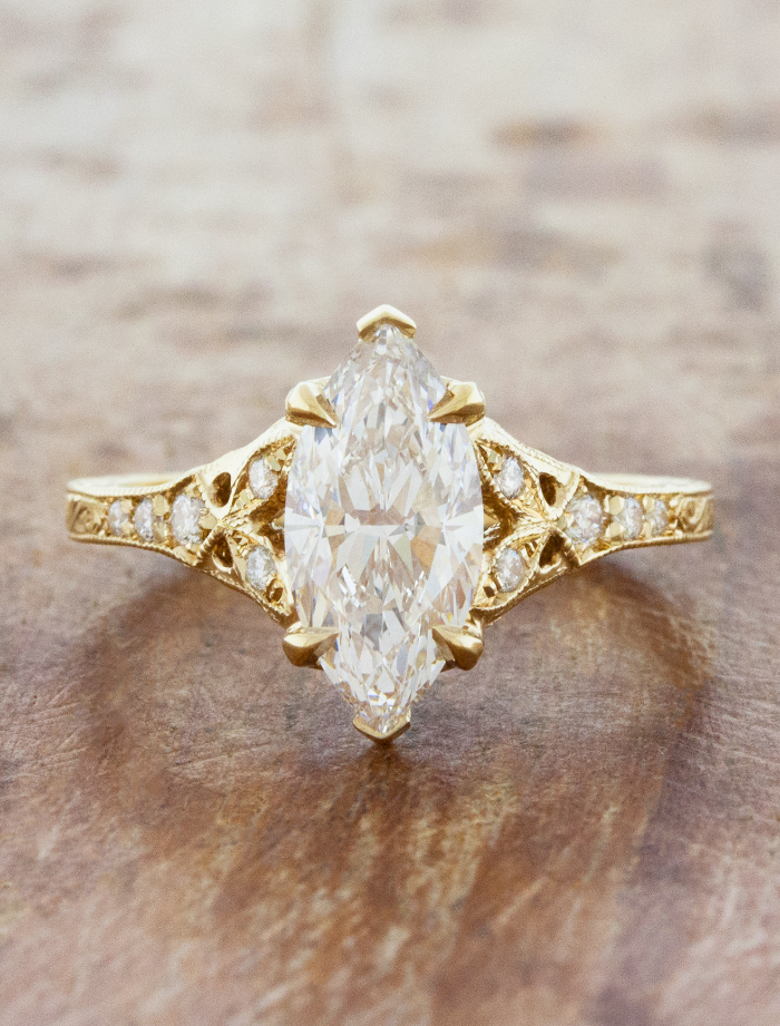 caption:Shown with 1.5ct marquise diamond in 14k yellow gold 
