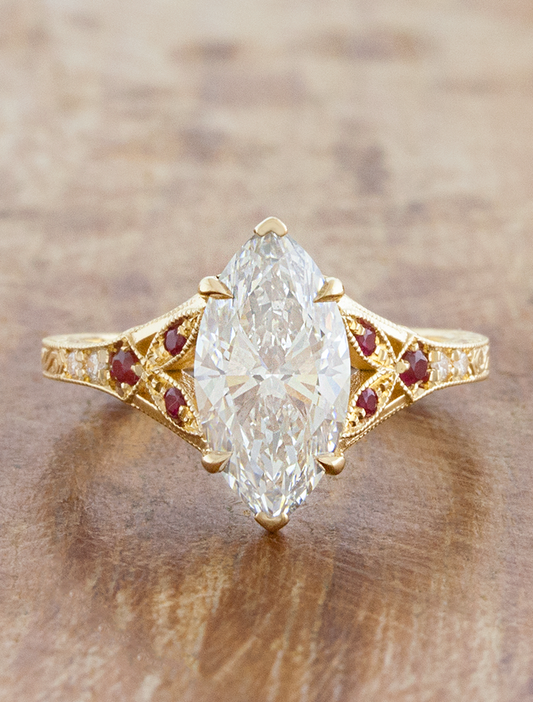 caption:Shown with 2ct marquise in 18k yellow gold