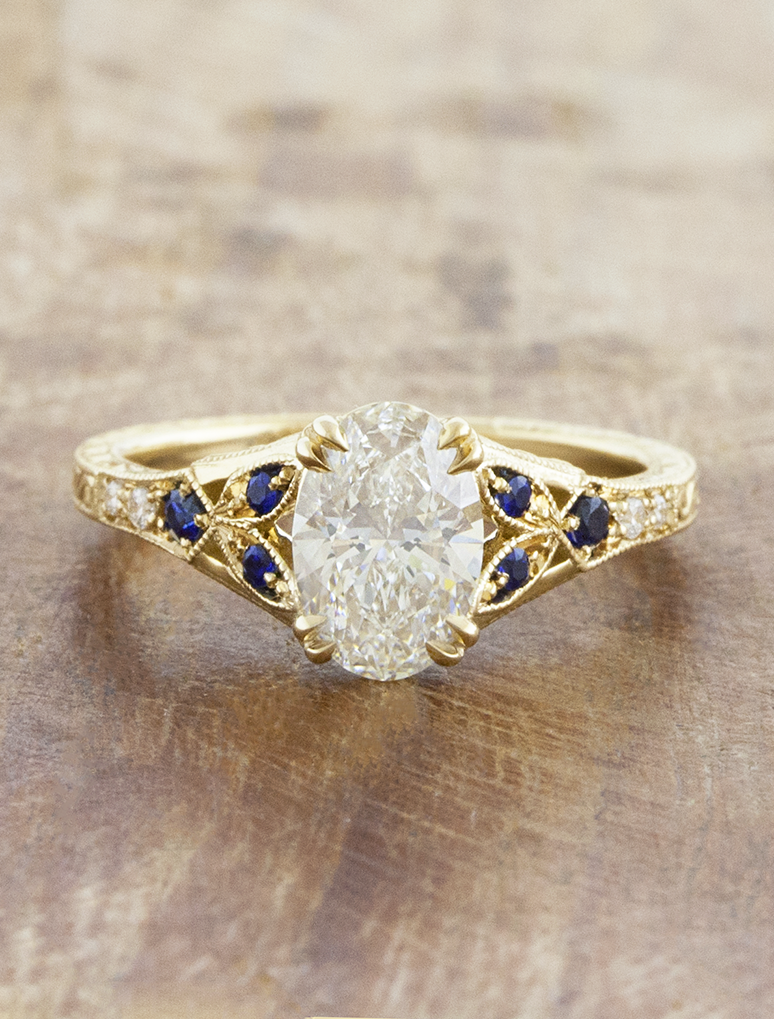 caption:Shown with 1ct oval in 14k yellow gold 