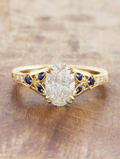 caption:Shown with 1ct oval in 14k yellow gold 
