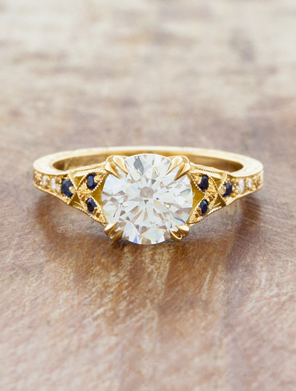 caption:Shown with 1.5ct round in 14k yellow gold
