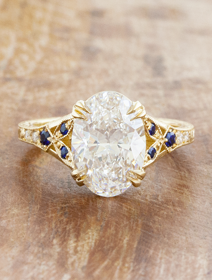 caption:Shown with 2.6ct oval in 14k yellow gold 