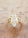 caption:Shown with 3ct marquise in 14k yellow gold