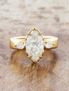 caption:Shown with 2.5ct marquise in 14k yellow gold