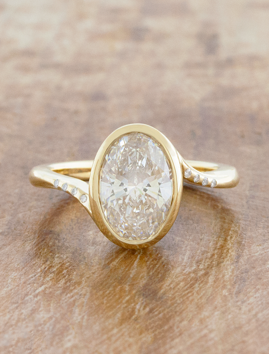 caption:Shown with 2ct oval in 14k yellow gold 