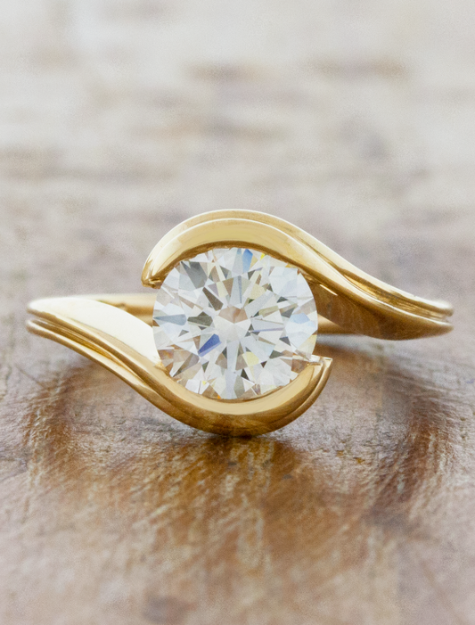 caption:Shown with 1.5ct round diamond in 14k yellow gold
