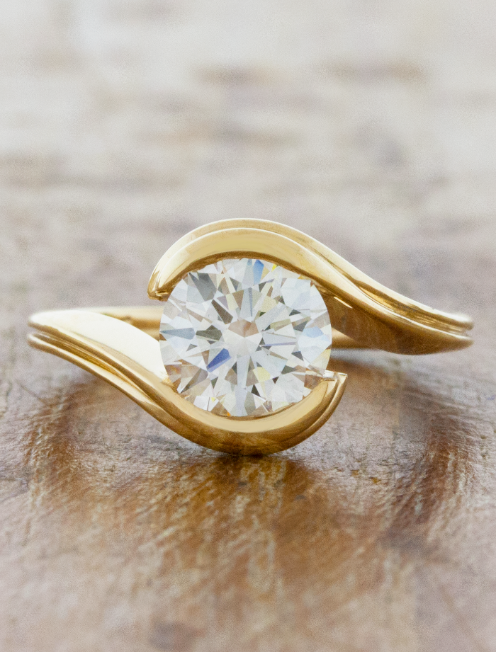caption:Shown with 1.5ct round diamond in 14k yellow gold