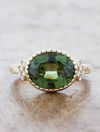 caption:Shown with 3.75ct oval green spinel