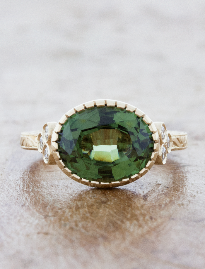 caption:Shown with 3.75ct oval green spinel